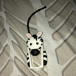 Hand sanitizer holder